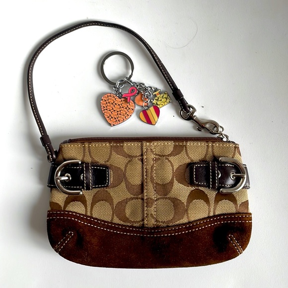 coach wristlet with charms